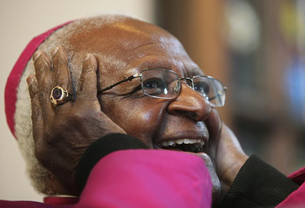 FILE - Nobel Peace Laureate, Archbishop Emeritus Desmond Tutu reacts during a press conference in Cape Town, South Africa, Thursday, July 22, 2010. Tutu, South Africa’s Nobel Peace Prize-winning activist for racial justice and LGBT rights and retired Anglican Archbishop of Cape Town, has died, South African President Cyril Ramaphosa announced Sunday Dec. 26, 2021. He was 90. (AP Photo, File)